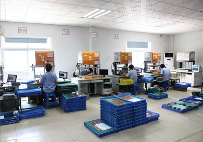 Mass production printed circuit boards are tested with e-test adapter machines Mass production printed circuit boards are tested with e-test adapter machines